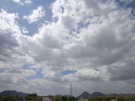 Figure 2. Excess cloud formation from ocean evaporation is an example of a negative feedback.[4]
