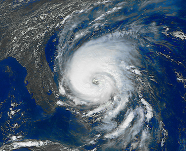 Figure 3: Hurricanes are giant storms that form over warm bodies of water and can devastate entire cities.[6]
