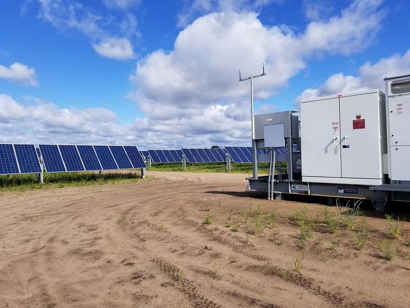 File:Solar panel and devices.jpg